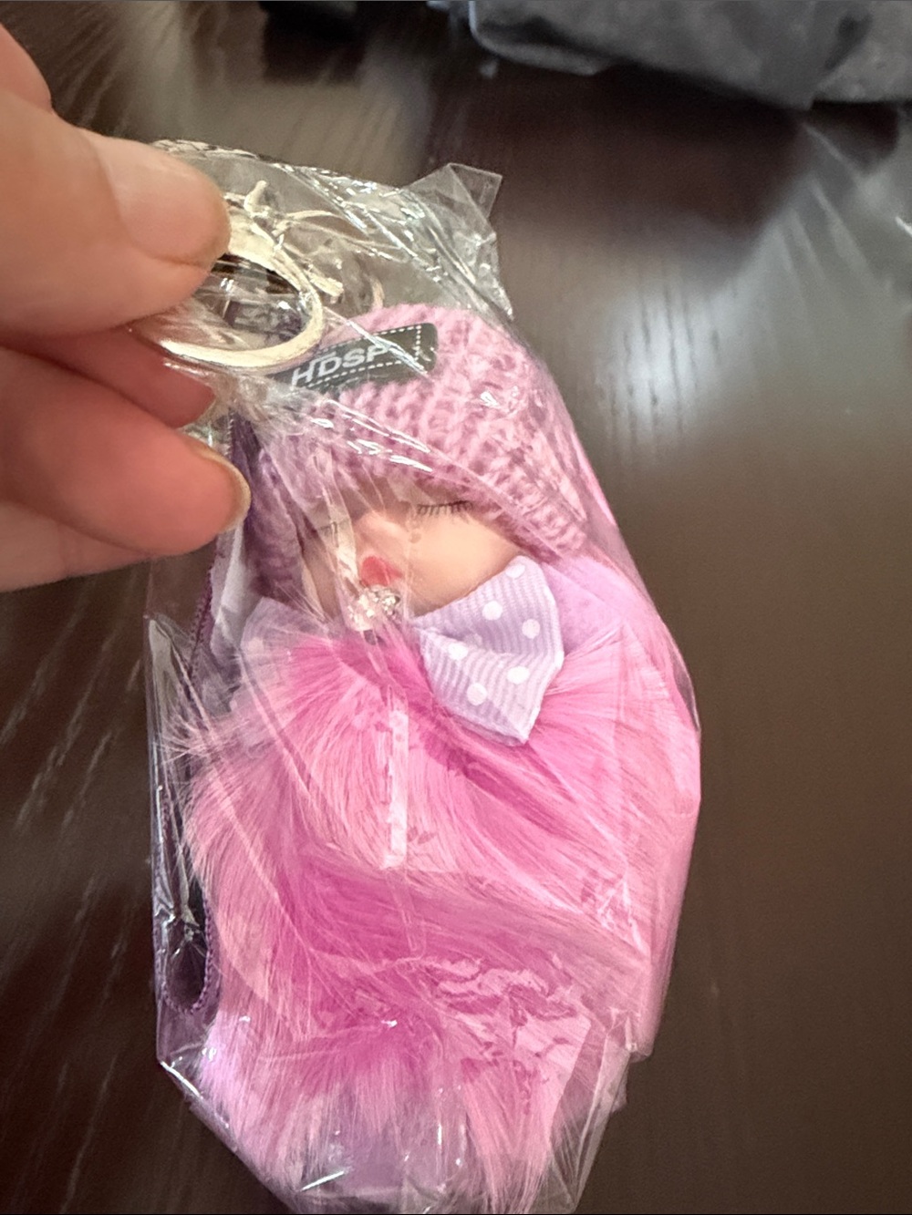 Plush Pink Baby Doll Keychain with Bow
